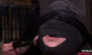 Gagged submissive clamped and caned while bound by master