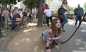 Bound slave takes big cock in public